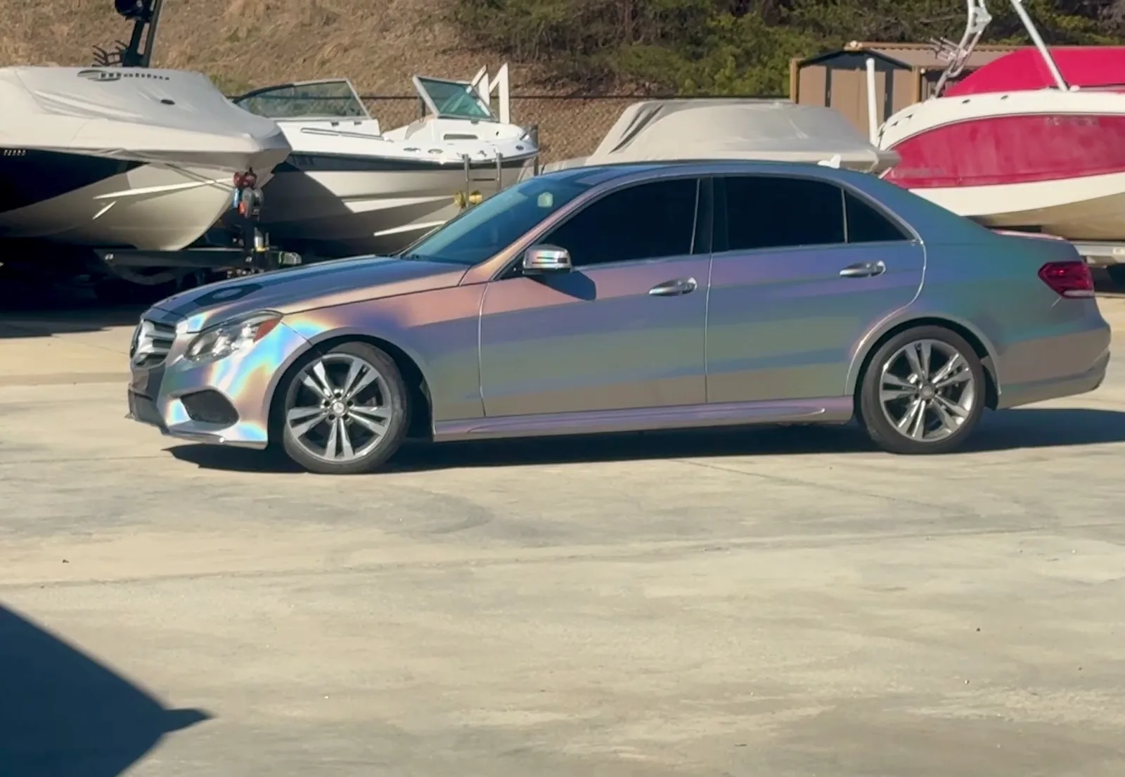 Mercedes E-Class after chrome color change wrap with matte accent line